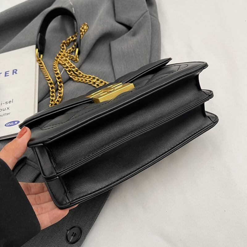 Bolsa Feminina de Ombro Preto e Dourado