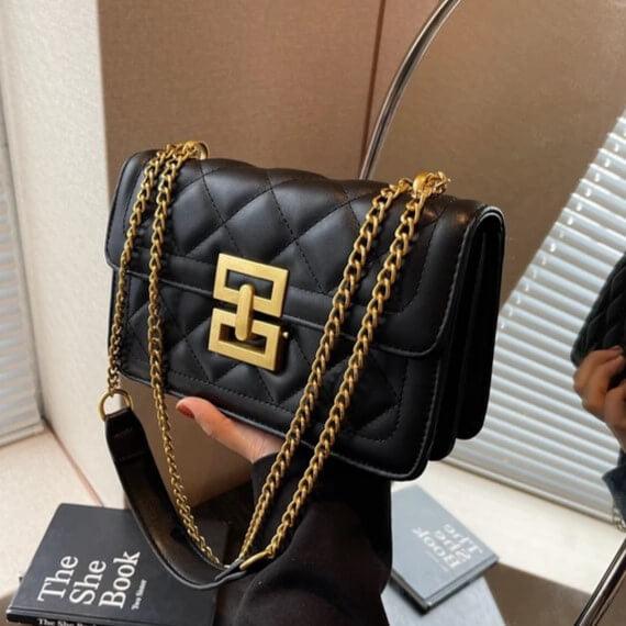 Bolsa Feminina de Ombro Preto e Dourado