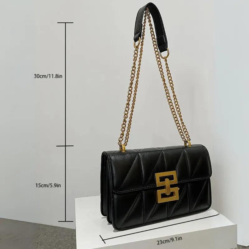 Bolsa Feminina de Ombro Preto e Dourado