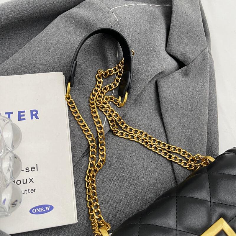 Bolsa Feminina de Ombro Preto e Dourado