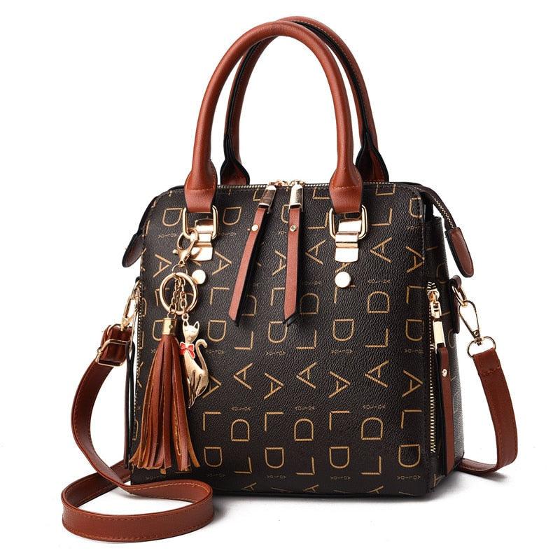 Bolsa Feminina em Couro Genuíno - Luxury + Chaveiro de Brinde