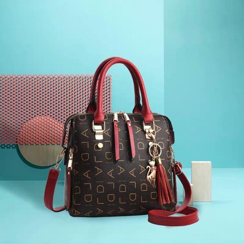 Bolsa Feminina em Couro Genuíno - Luxury + Chaveiro de Brinde