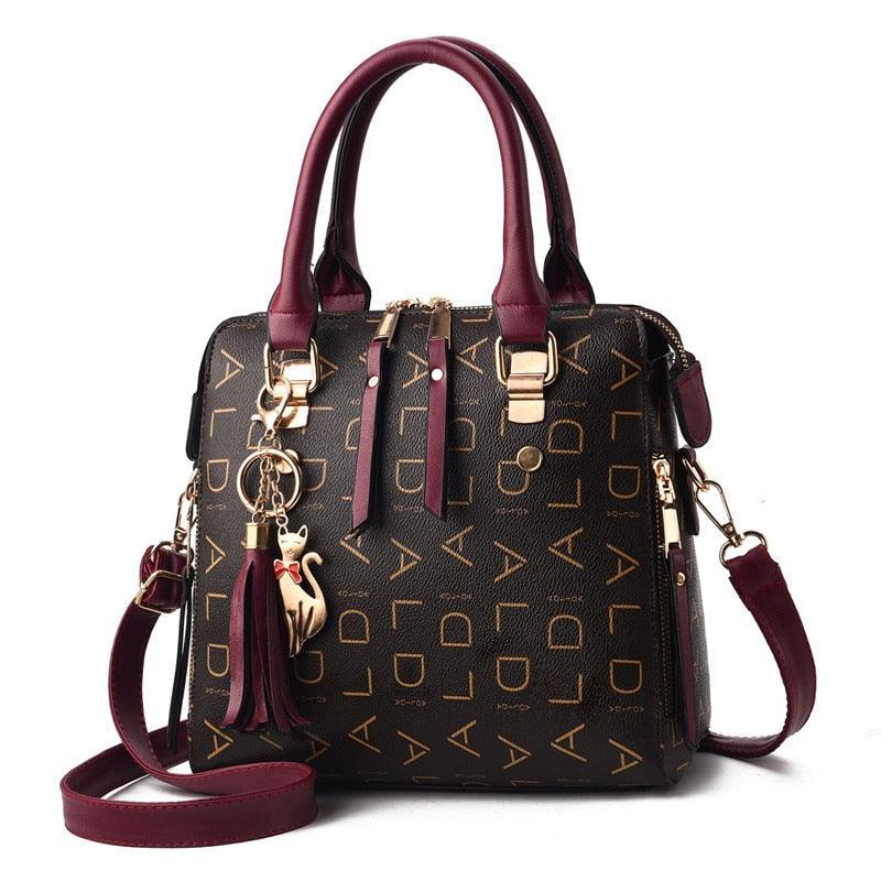 Bolsa Feminina em Couro Genuíno - Luxury + Chaveiro de Brinde
